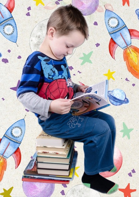 Image of a kid reading from a book