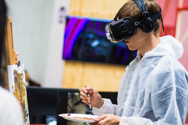 Image of a kid playing Virtual Reality